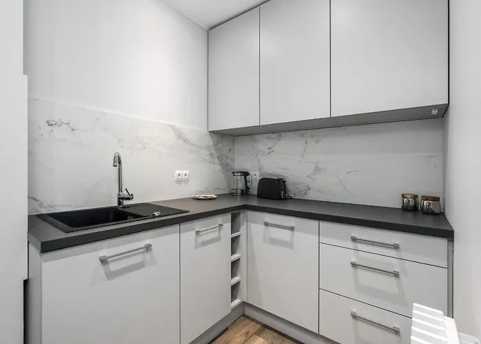 Maraton Gardens By Renters Апартаменты Познань